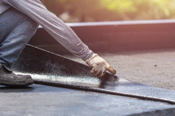 Professional Waterproofing technician working in Cambridge, MN
